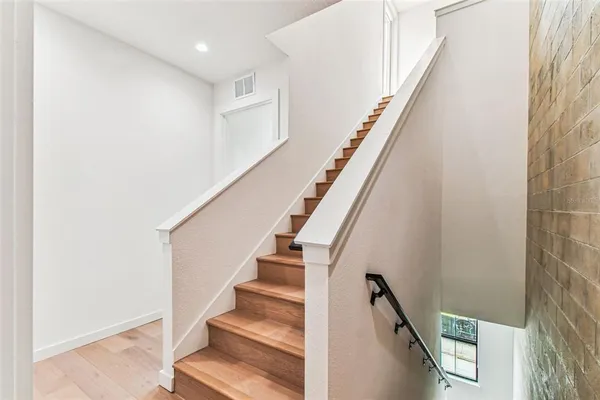 an aerial view of a house with outdoor space