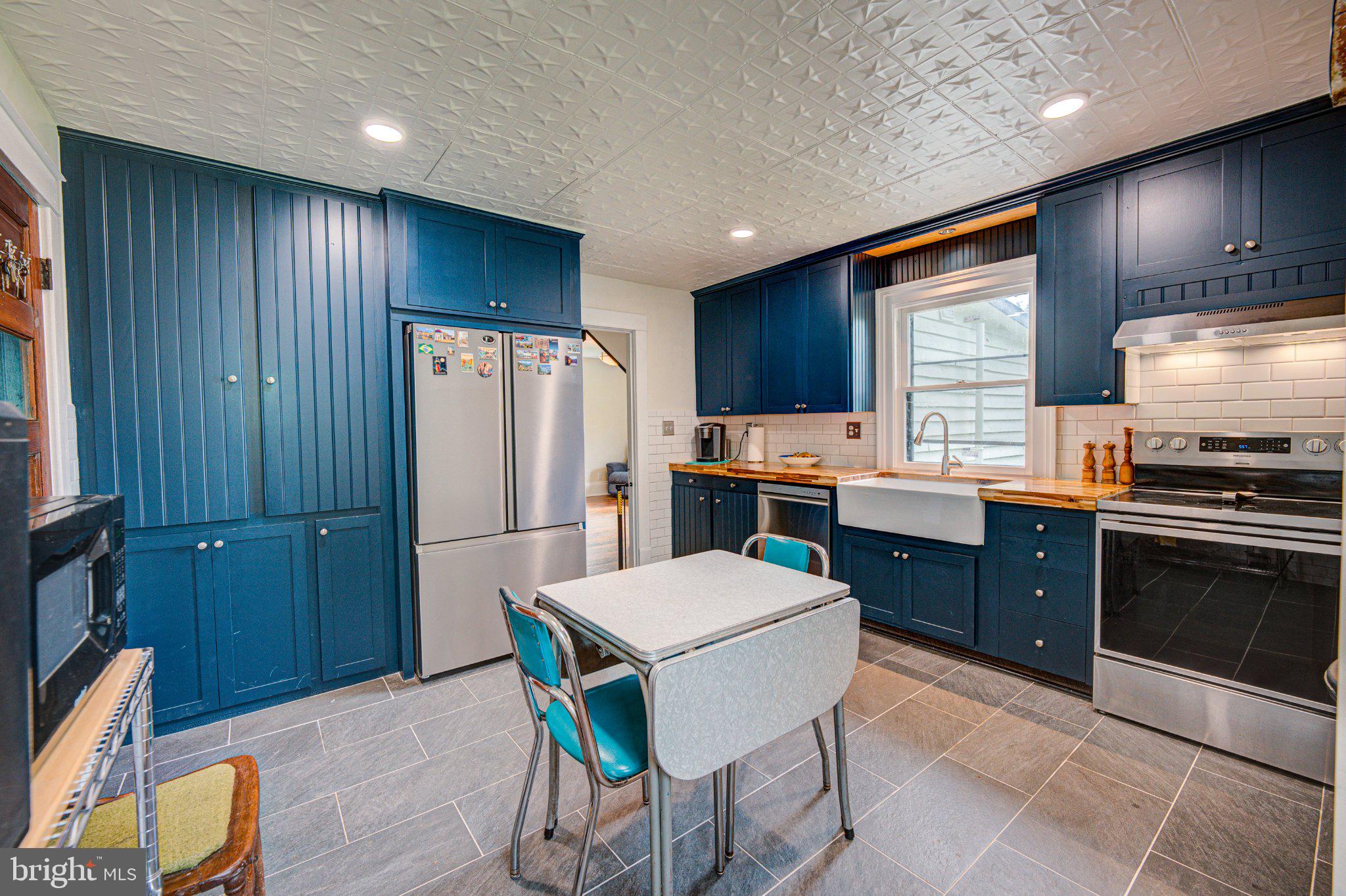 24177 Rapidan Road Mitchells, VA 22729 - Photo 5 of 43 Charming kitchen with modern flair.