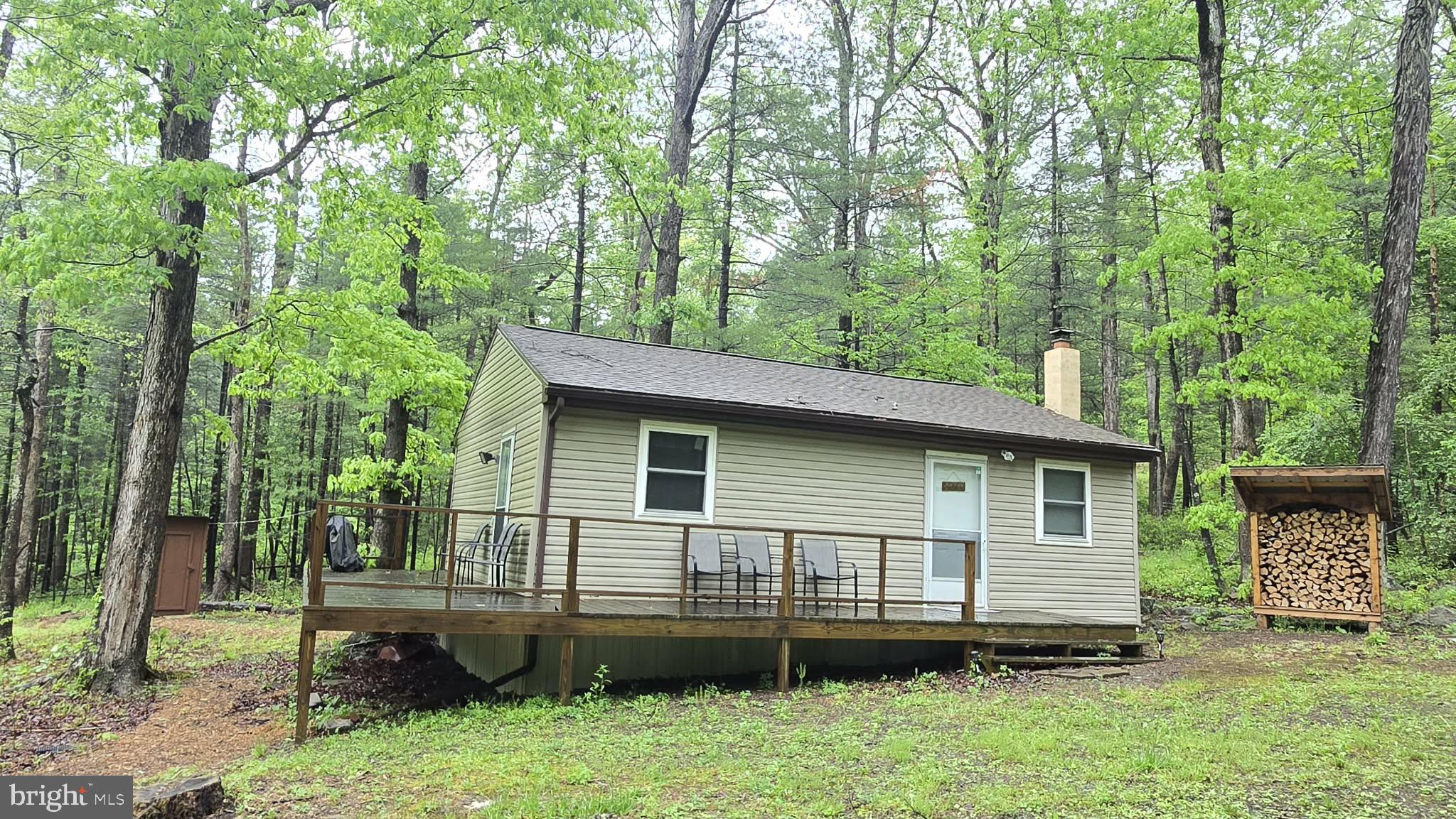 8245 Aughwick Road Fort Loudon, PA 17224 - Photo 3 of 26 a backyard of a house with lots of green space