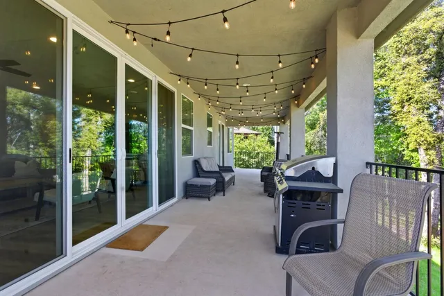 a view of living room filled with furniture and garden