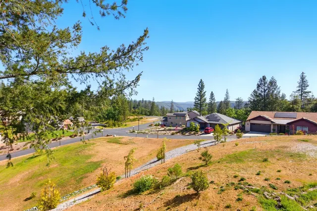 a view of swimming pool with outdoor seating
