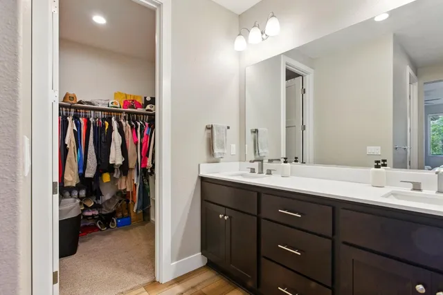 a view of a bathroom sink and a mirror