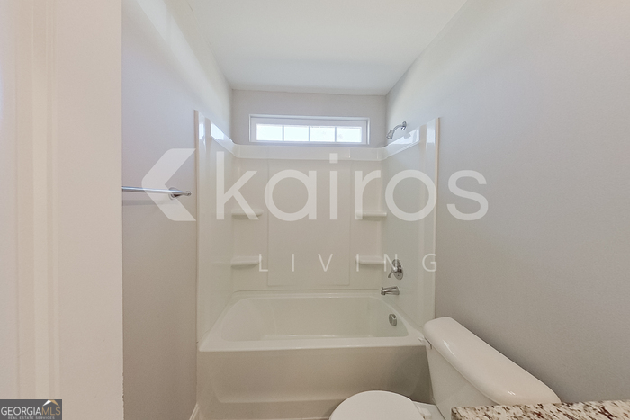 228 Western Red Cedar Drive Springfield, GA 31329 - Photo 14 of 27 a bathroom with a shower and a toilet