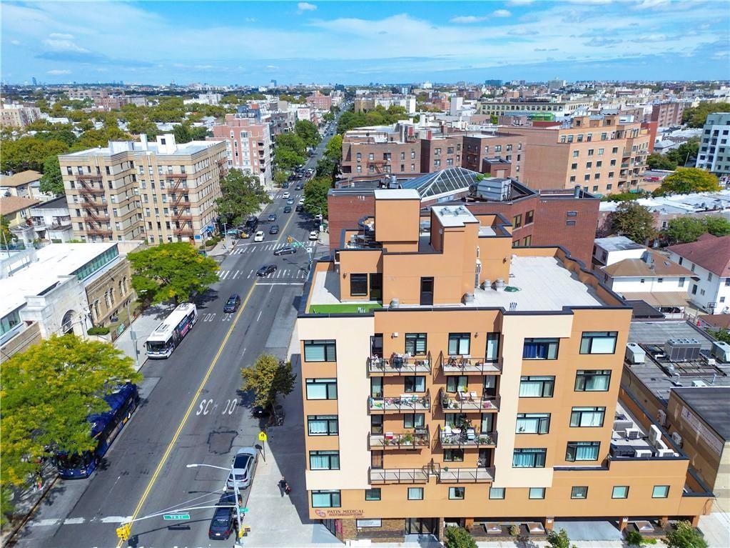 7819 Bay Parkway, Unit PH Brooklyn, NY 11214 - Photo 20 of 28 a view of a city with tall buildings
