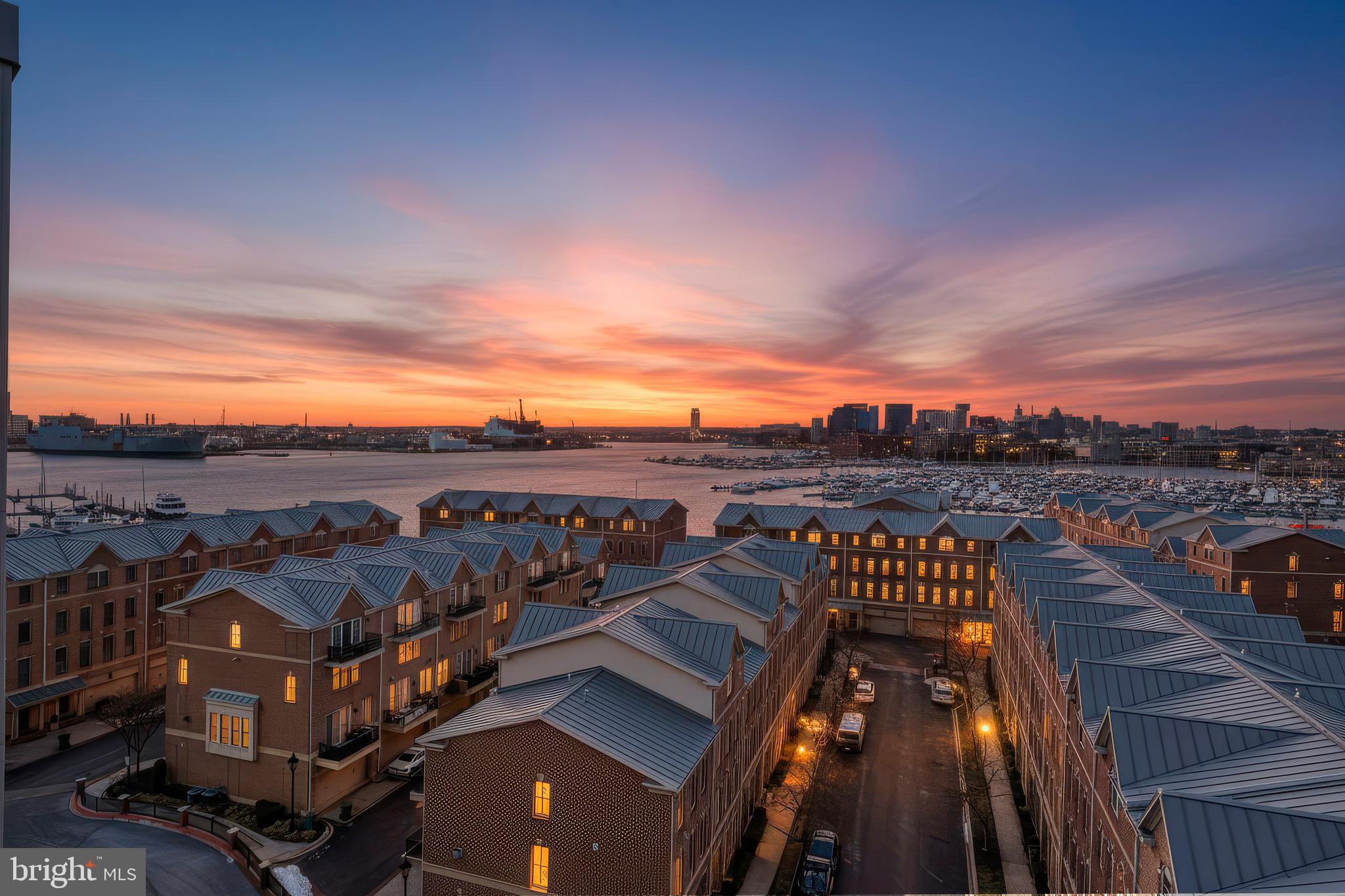 2702 Lighthouse Point East, Unit 720 Baltimore, MD 21224 - Photo 26 of 37 a view of a balcony with city view