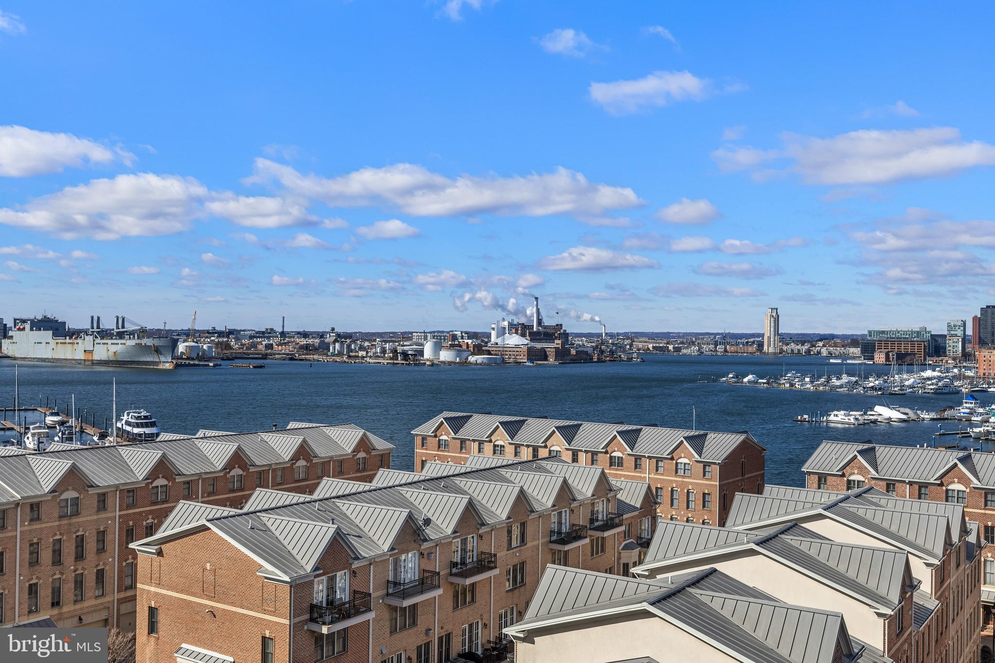 2702 Lighthouse Point East, Unit 720 Baltimore, MD 21224 - Photo 28 of 37 a view of a terrace with sitting area