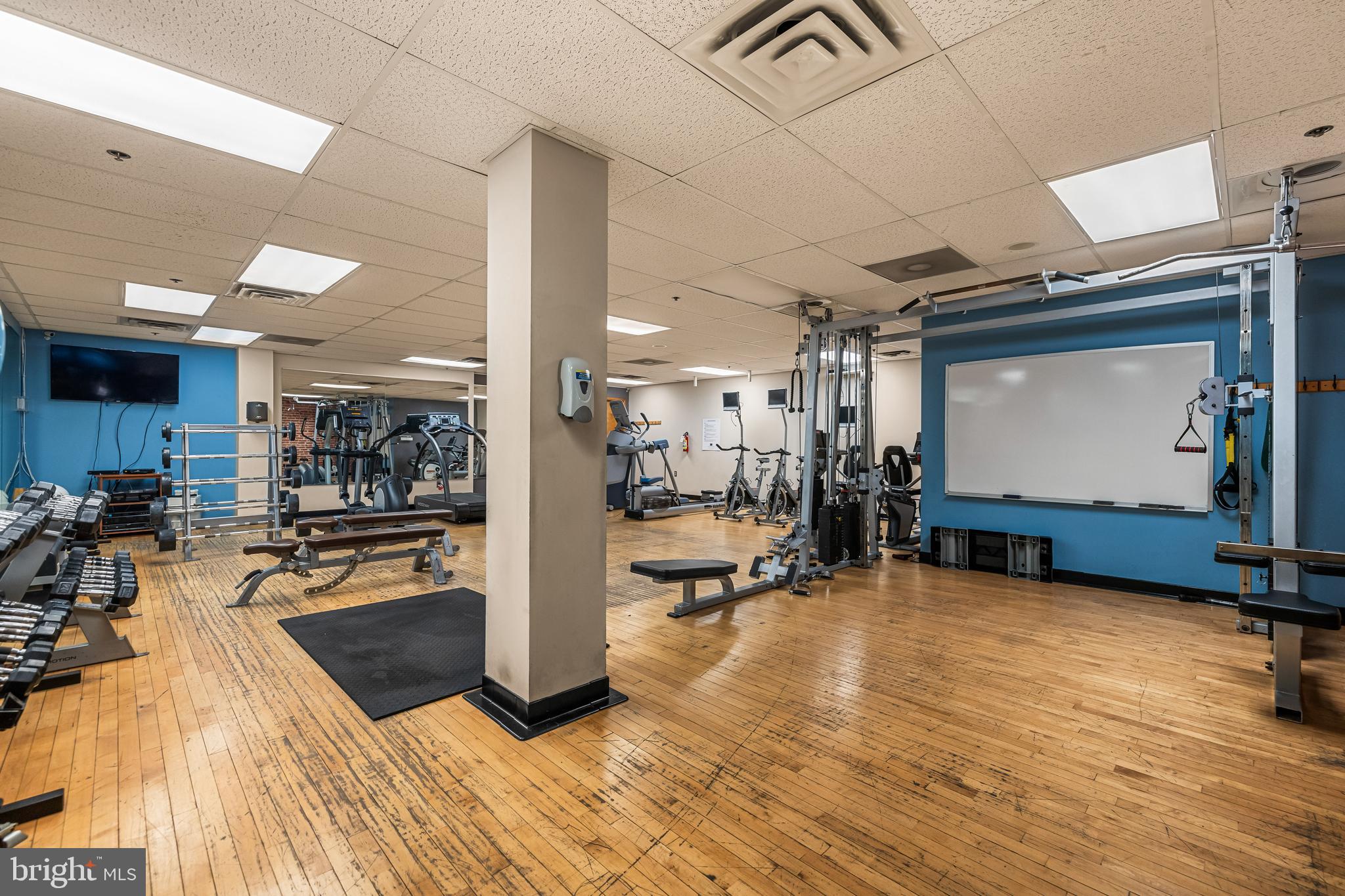 2702 Lighthouse Point East, Unit 720 Baltimore, MD 21224 - Photo 32 of 37 a view of a room with gym equipment