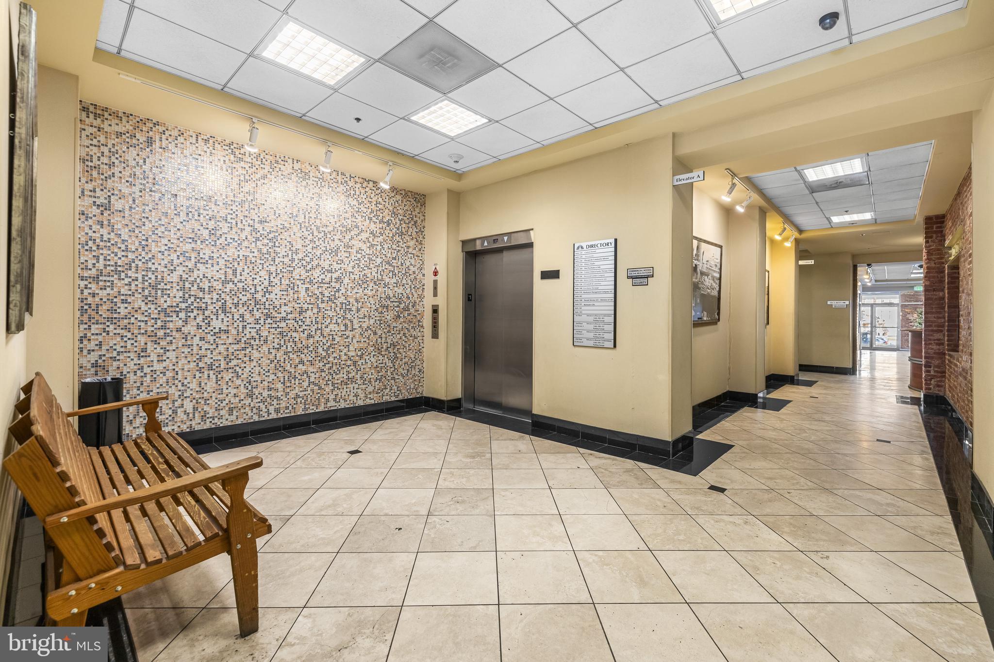 2702 Lighthouse Point East, Unit 720 Baltimore, MD 21224 - Photo 35 of 37 a view of a livingroom with furniture and an empty room