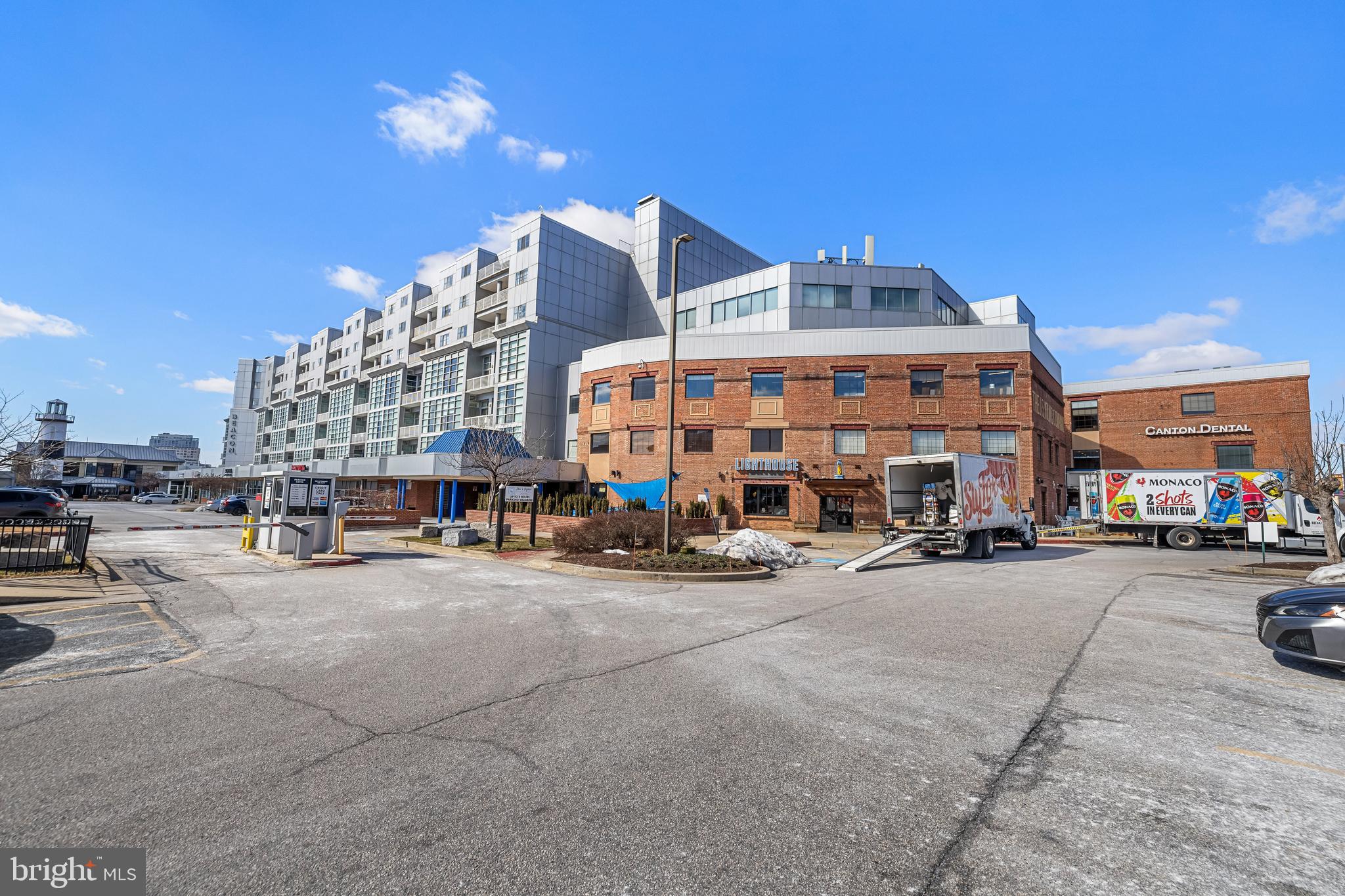 2702 Lighthouse Point East, Unit 720 Baltimore, MD 21224 - Photo 36 of 37 a view of a street with cars