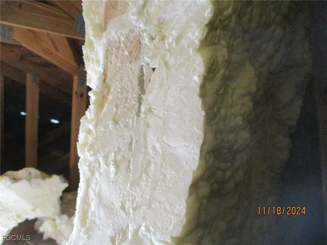 a view of a balcony with wooden floor