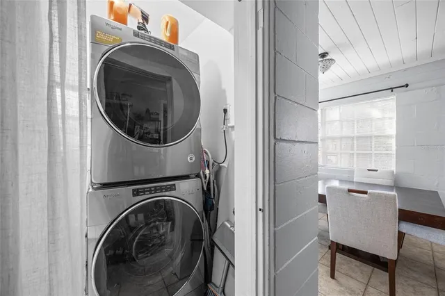 a utility room with dryer and washer