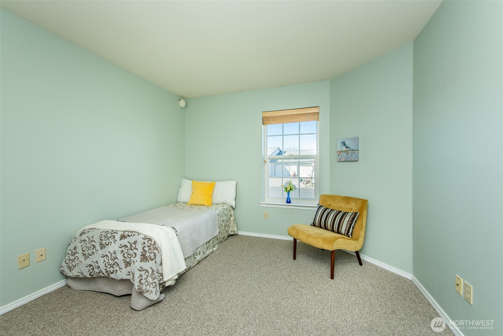 892 North Oxford Way Sequim, WA 98382 - Photo 20 of 38 a bedroom with a bed and a couch