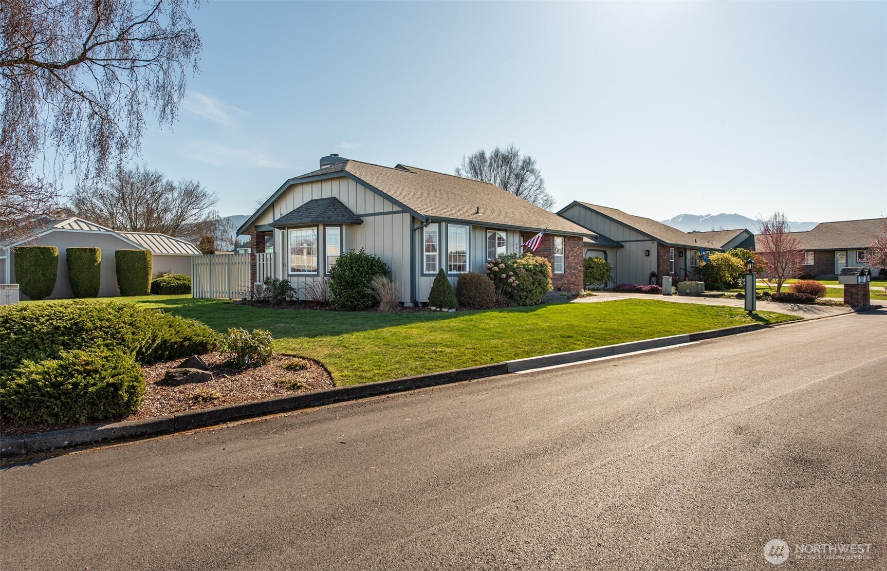 892 North Oxford Way Sequim, WA 98382 - Photo 33 of 38 a view of house with a yard and potted plants