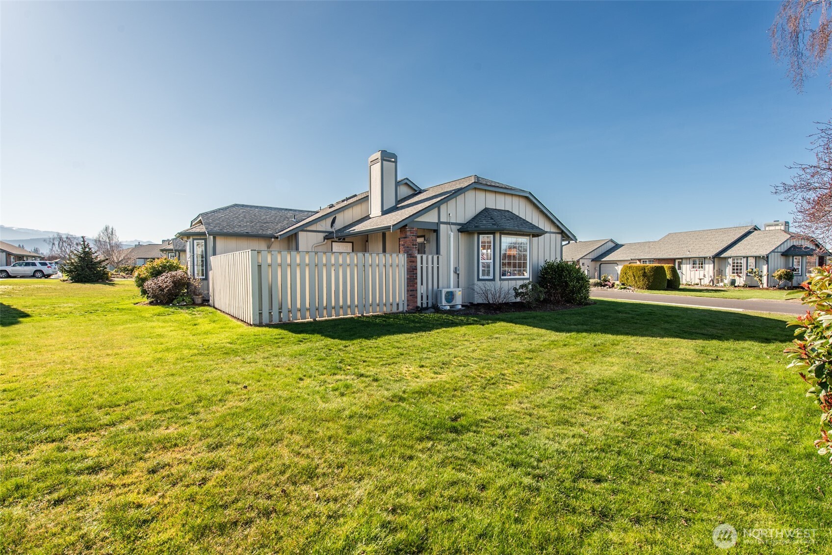 892 North Oxford Way Sequim, WA 98382 - Photo 34 of 38 a front view of a house with a garden