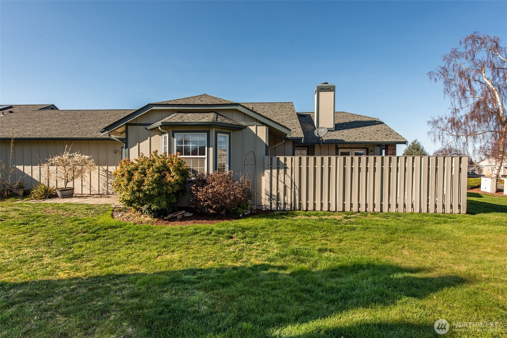 892 North Oxford Way Sequim, WA 98382 - Photo 35 of 38 a front view of a house with garden