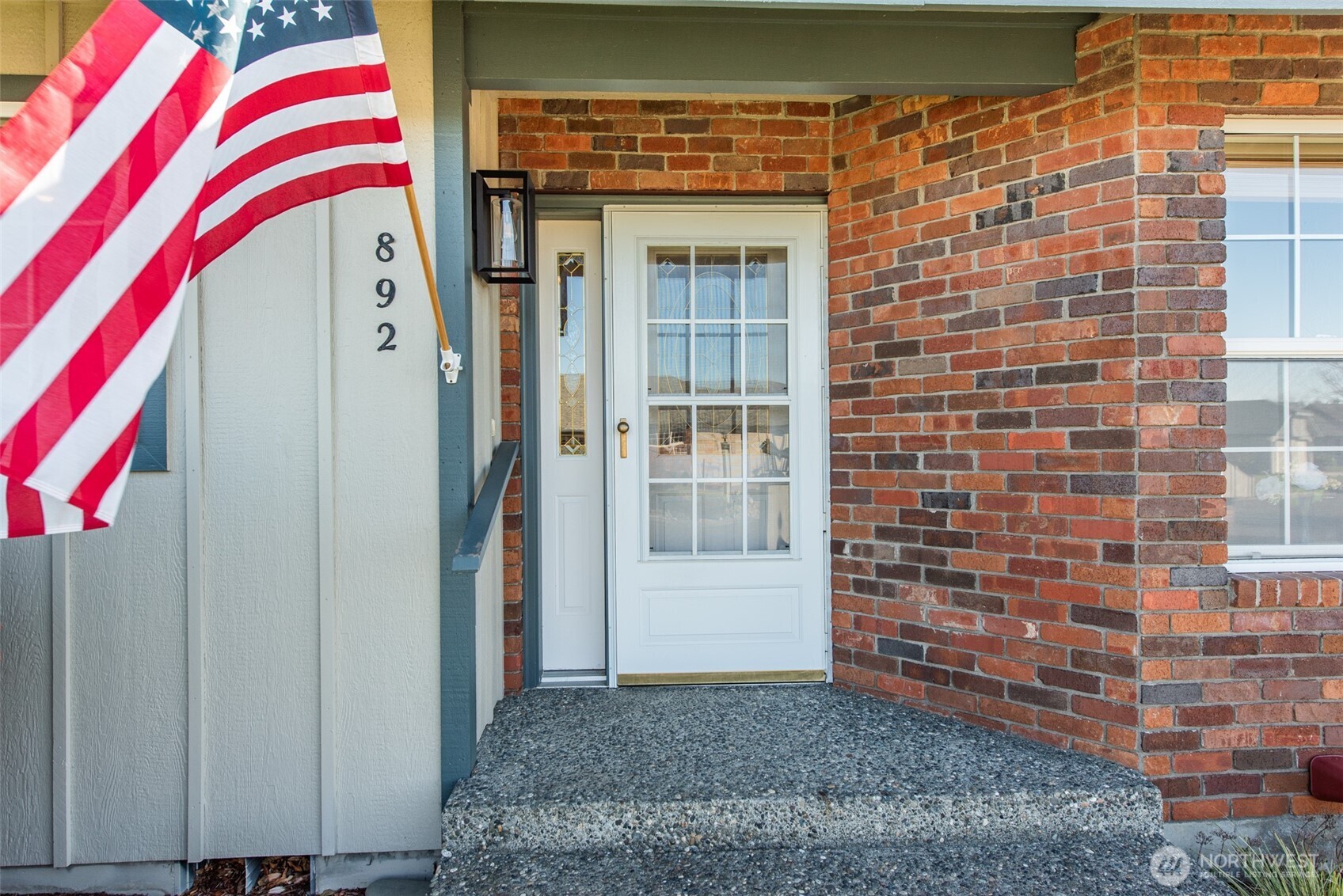892 North Oxford Way Sequim, WA 98382 - Photo 4 of 38 a view of a wooden door of the house