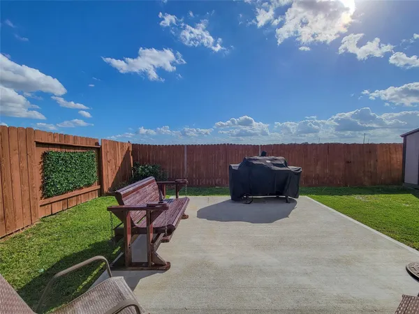 a house view with a garden space