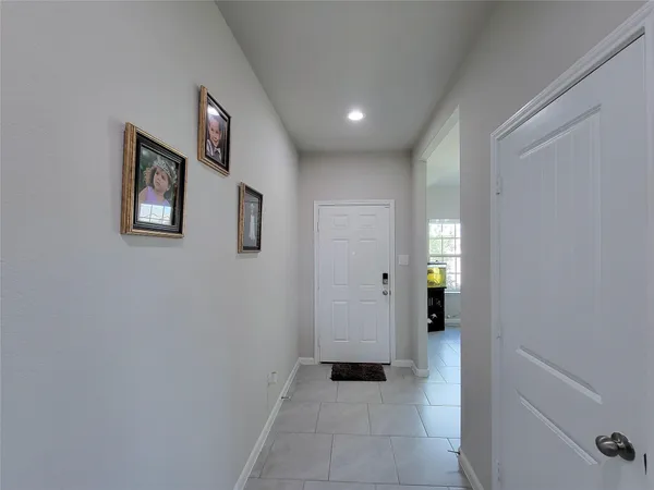 a living room with furniture and window