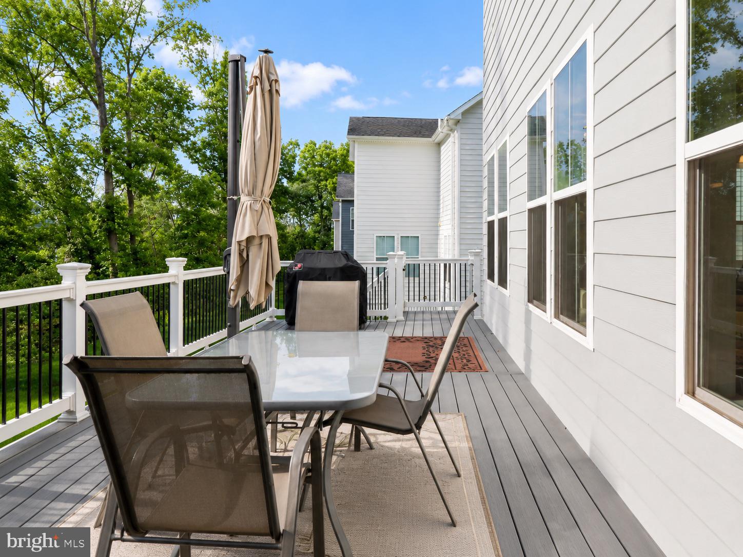23609 Roselle Ridge Lane Aldie, VA 20105 - Photo 33 of 75 Serene deck with lush green views.