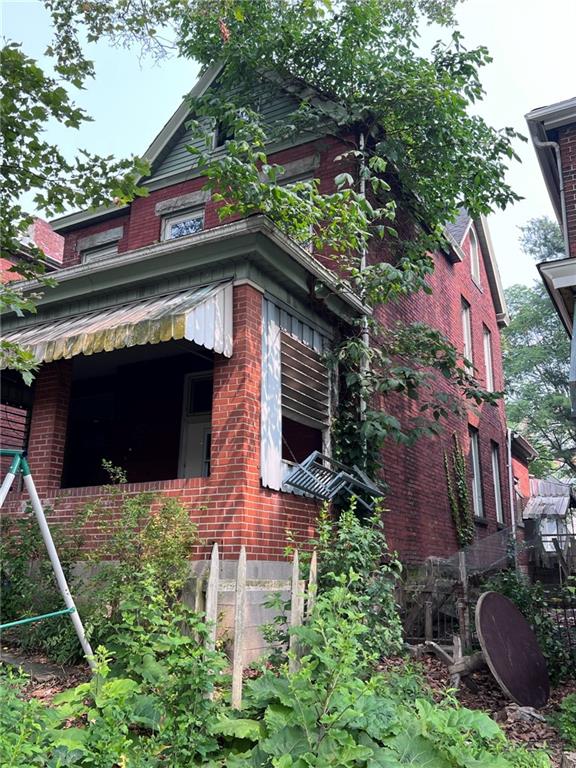 137 Zara Street Pittsburgh, PA 15210 - Photo 12 of 12 aerial view of a house with a garden