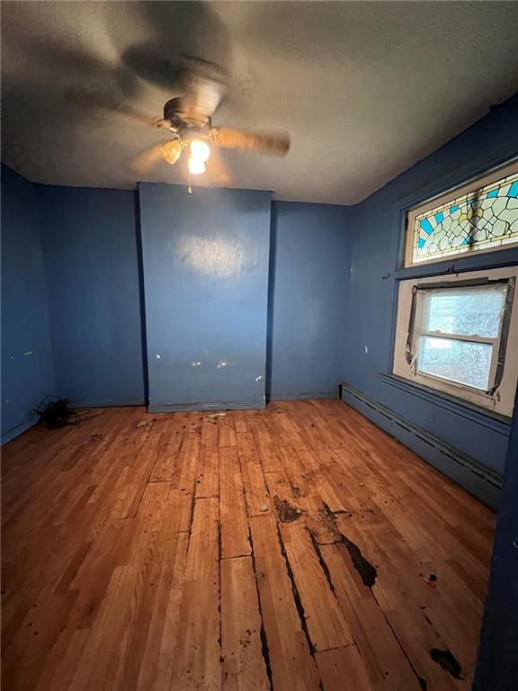 137 Zara Street Pittsburgh, PA 15210 - Photo 2 of 12 a view of empty room with a window