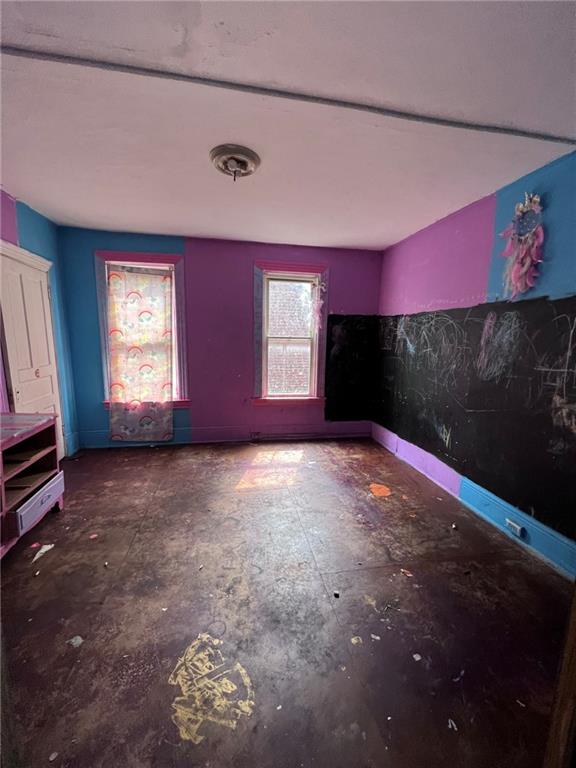 137 Zara Street Pittsburgh, PA 15210 - Photo 8 of 12 a view of an empty room with a window