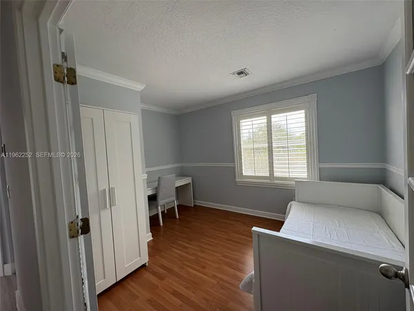 a view of livingroom with furniture and wooden floor
