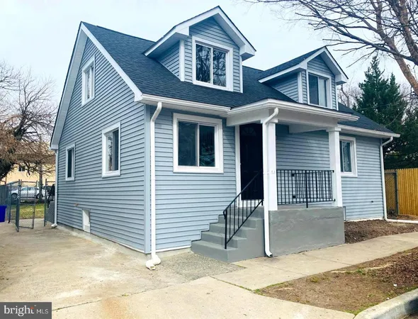 a front view of a house with a garage