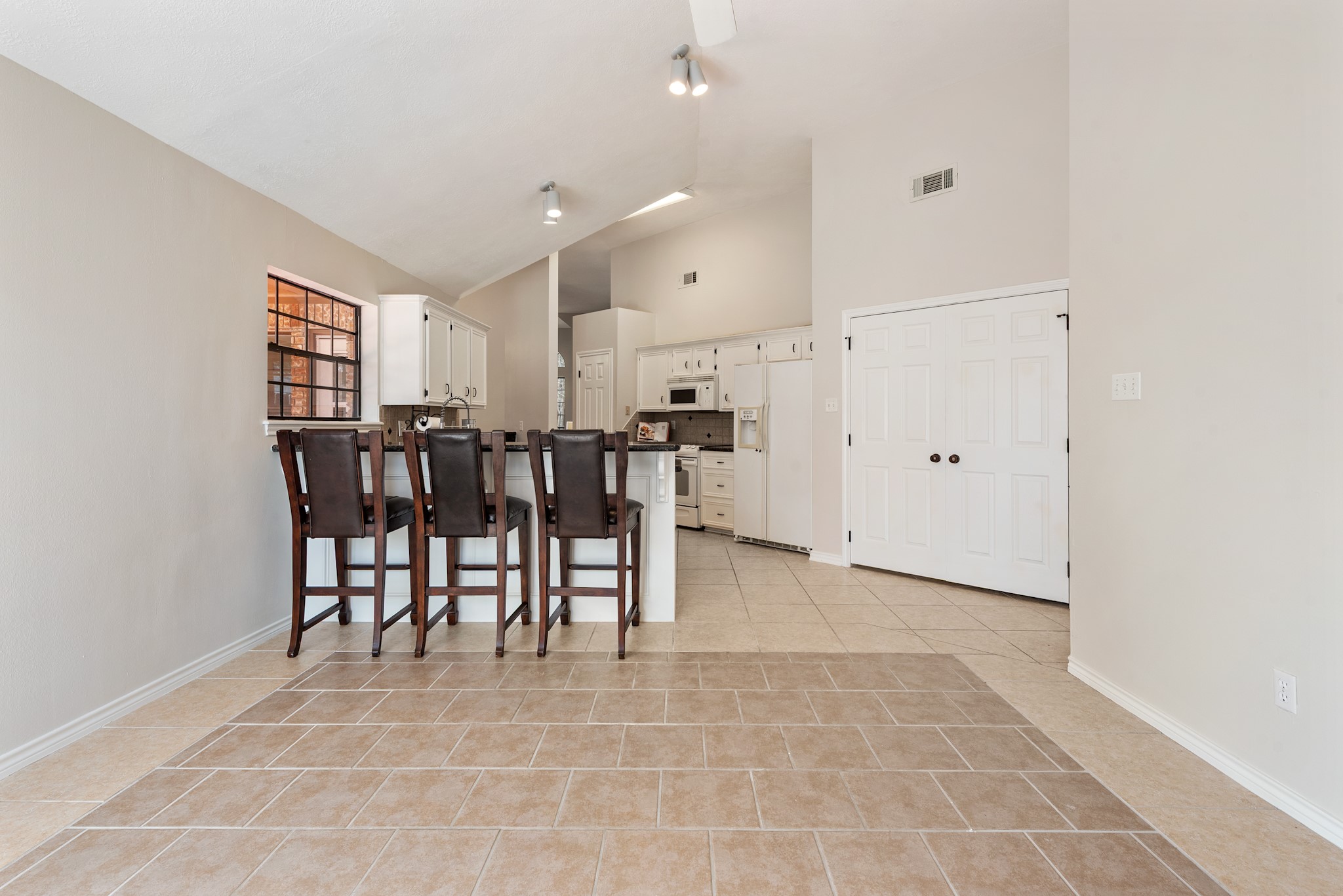 4505 Kensington Road Bryan, TX 77802 - Photo 12 of 26 Family room is open to the kitchen for the ultimate in entertaining