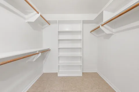 a view of an empty walk in closet