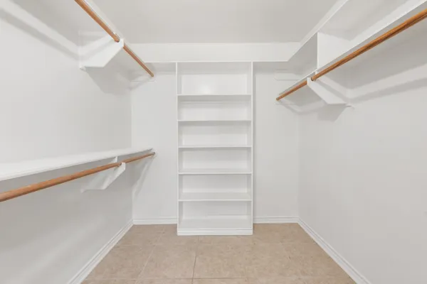 a view of an empty walk in closet
