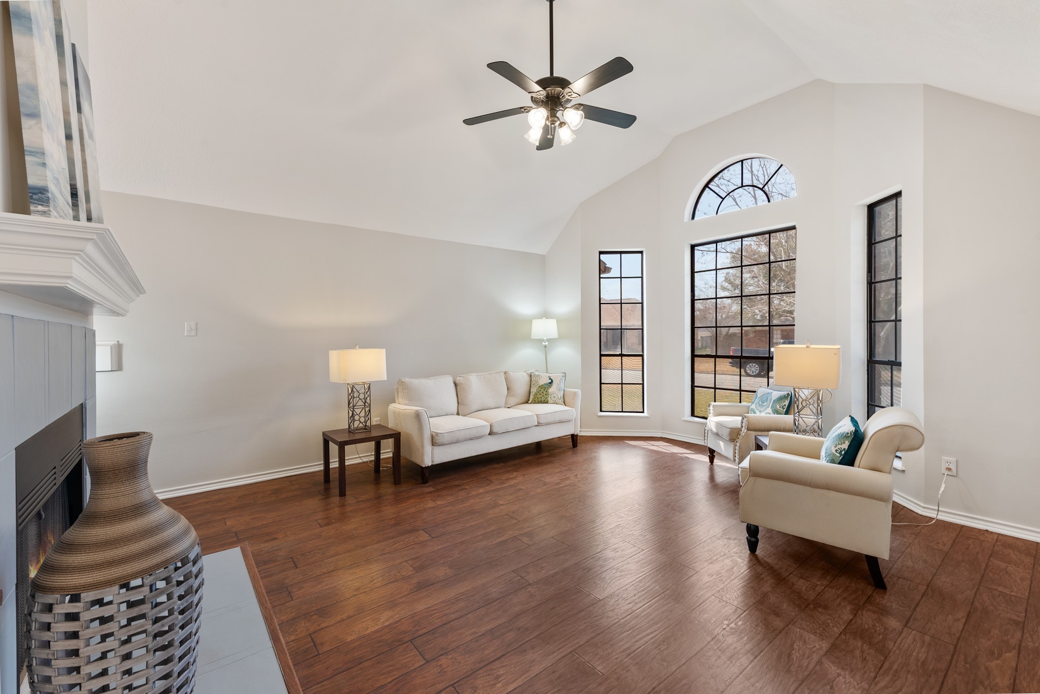 4505 Kensington Road Bryan, TX 77802 - Photo 2 of 26 Bright bay windows and clean laminate floors in the main living area