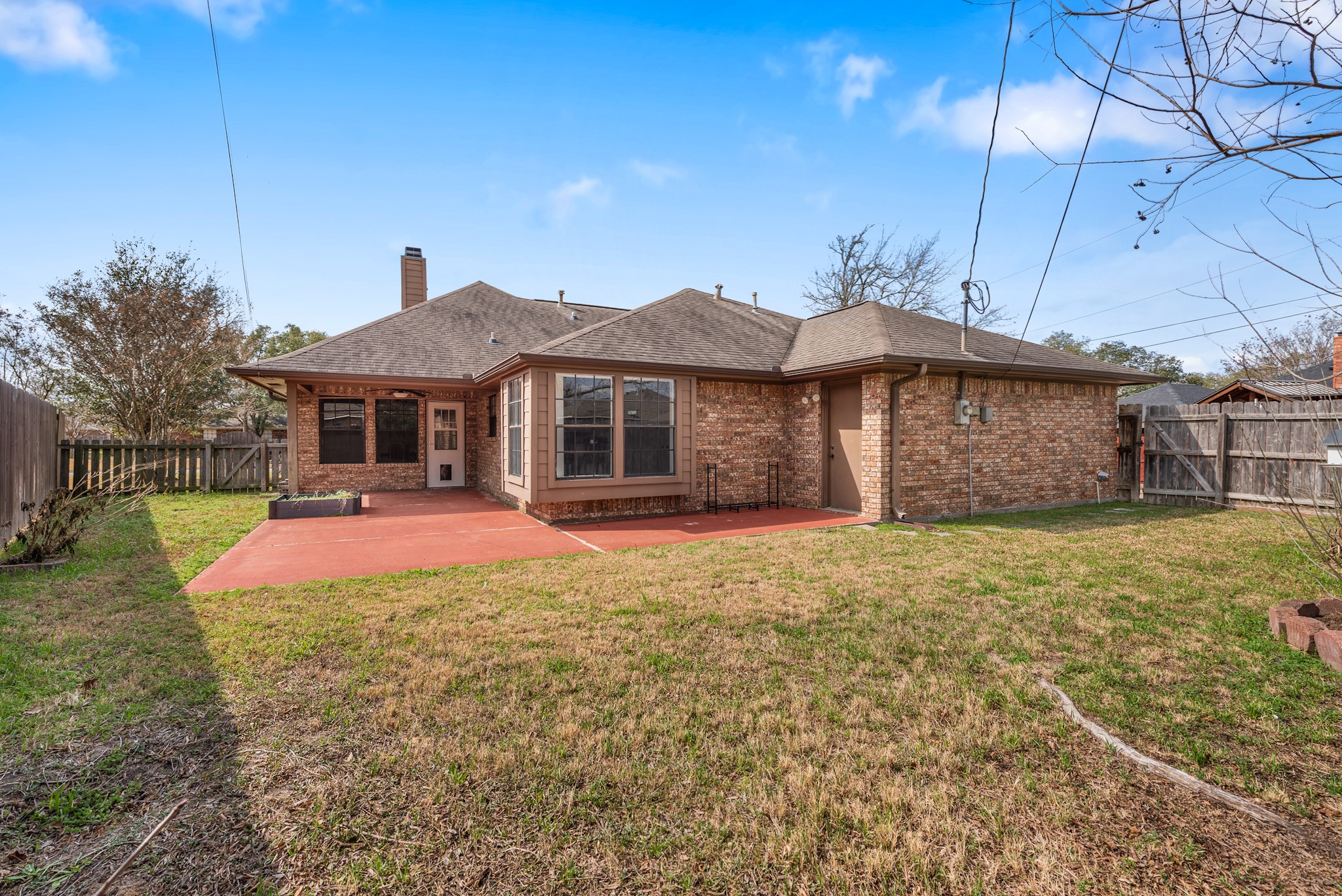 4505 Kensington Road Bryan, TX 77802 - Photo 25 of 26 Back patio area is large and has access from house and garage. Plenty of space for entertaining or relaxing. Plumbing in place for outdoor sink - create your perfect outdoor dining space