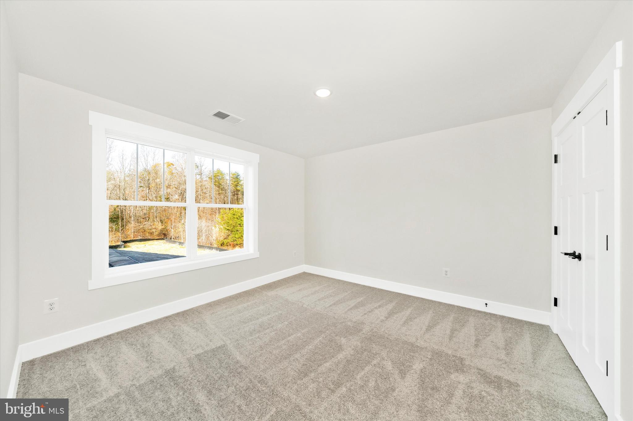 1154 Mt Zion Marlboro Road Lothian, MD 20711 - Photo 34 of 66 a view of an empty room with a window