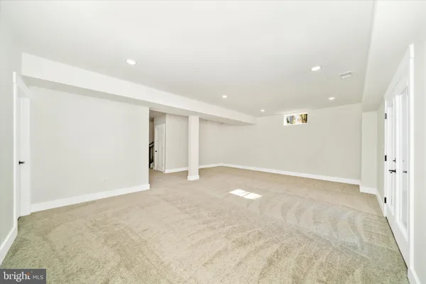 a view of a house with snow on the background