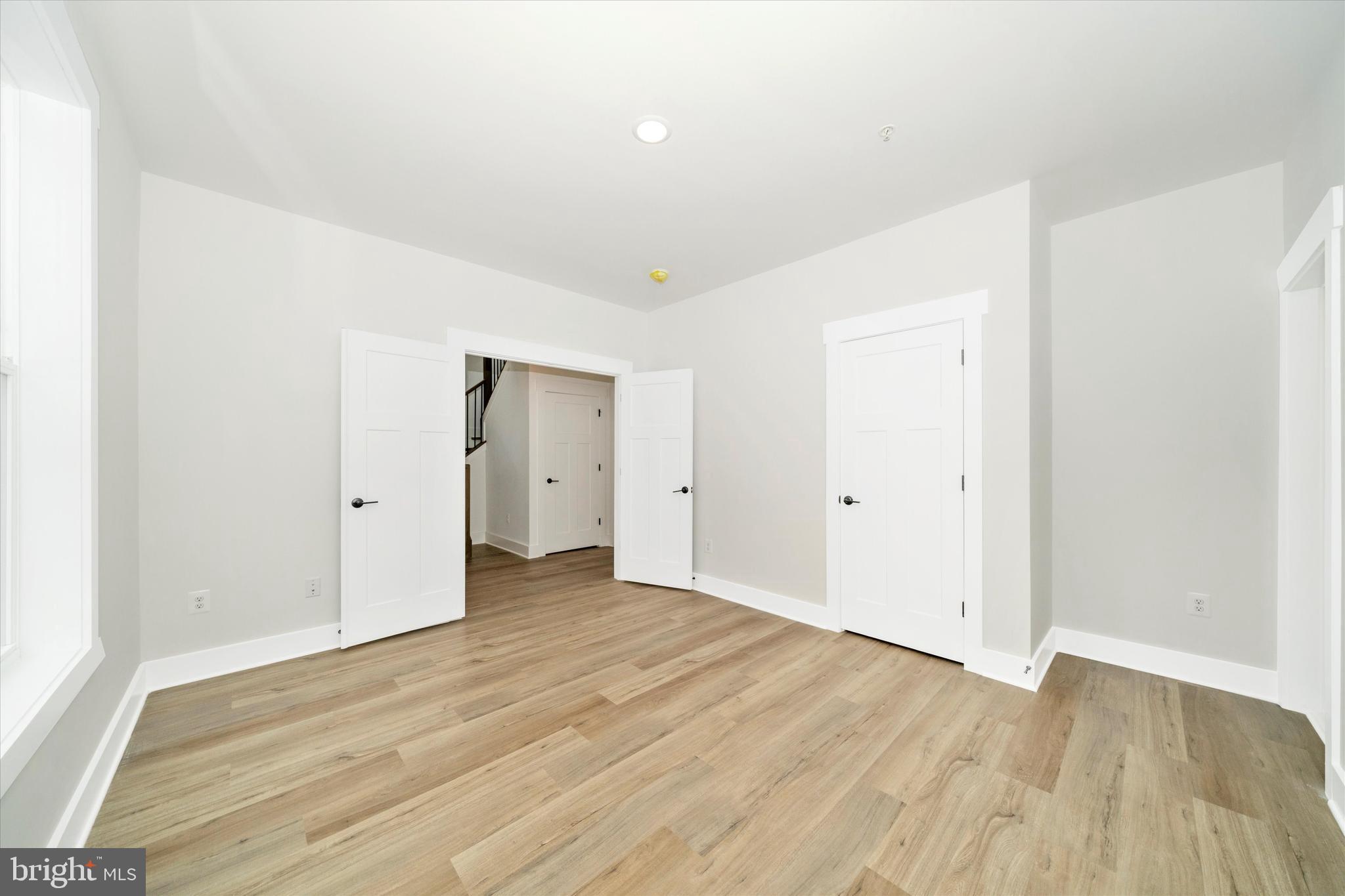1154 Mt Zion Marlboro Road Lothian, MD 20711 - Photo 5 of 66 a view of an empty room with wooden floor