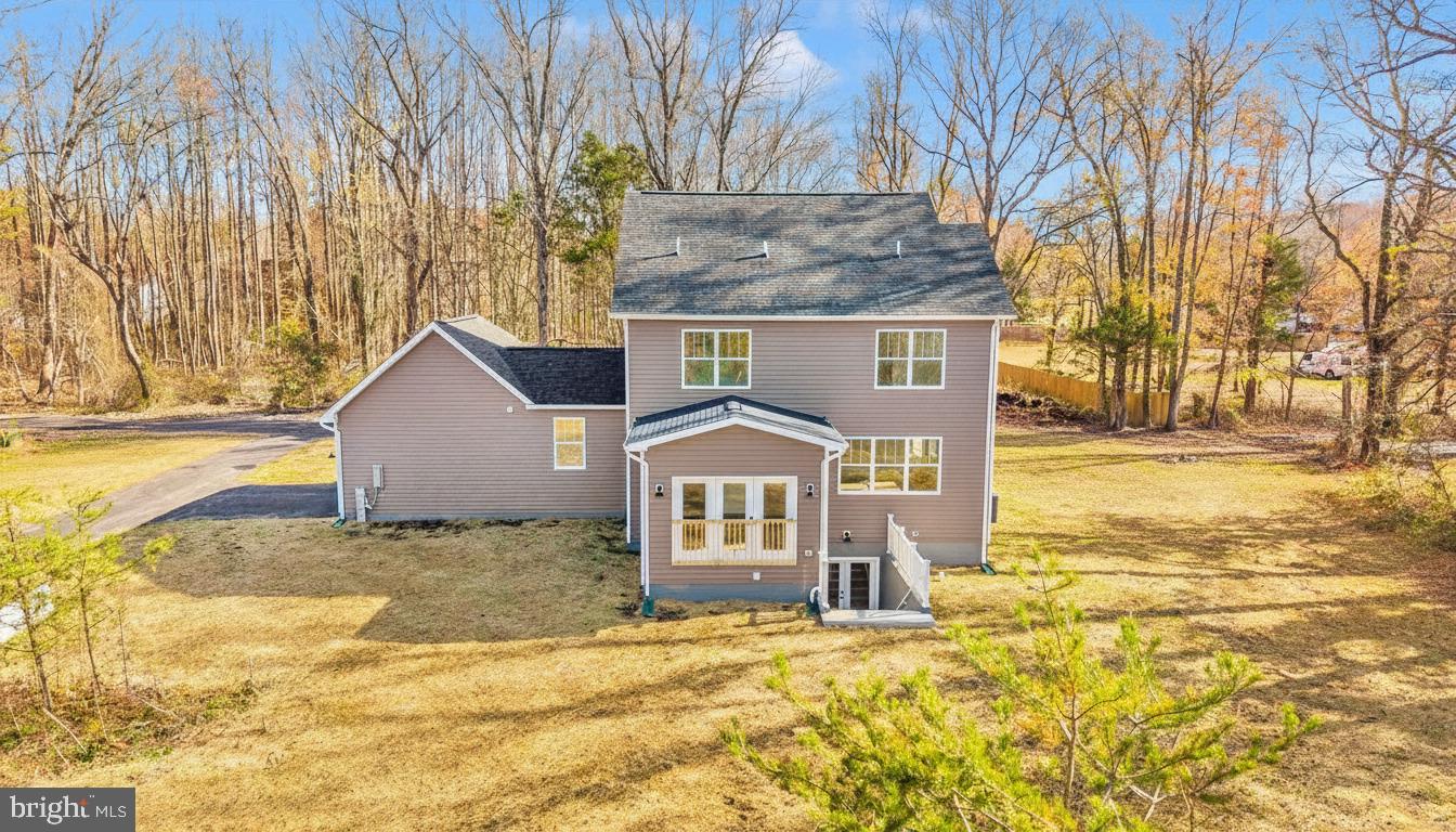 1154 Mt Zion Marlboro Road Lothian, MD 20711 - Photo 57 of 66 a front view of a house with a yard