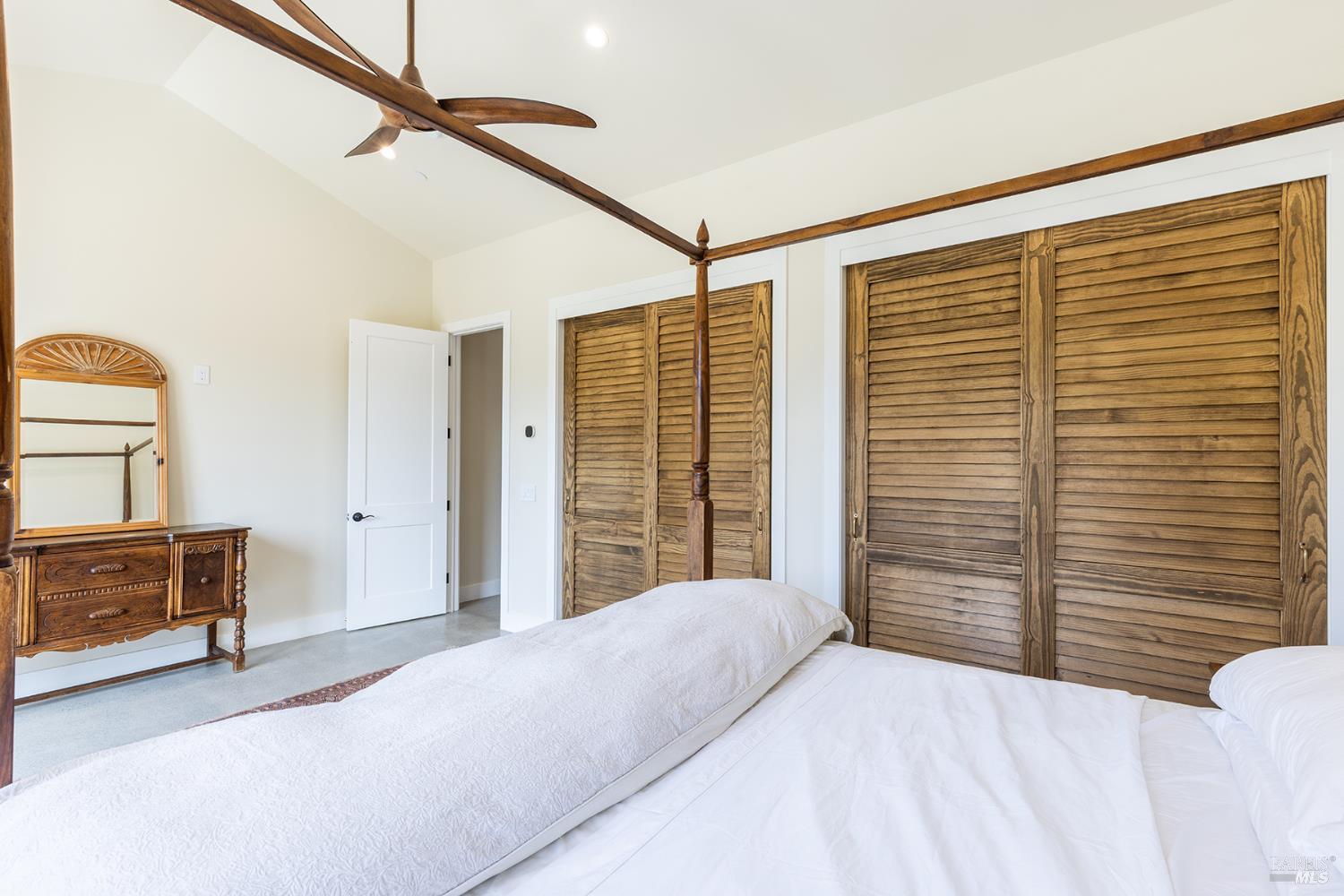 753 Sunnyside Road St. Helena, CA 94574 - Photo 28 of 55 a bedroom with a bed and furniture