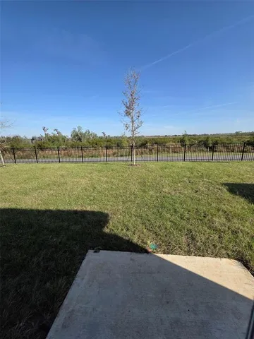 a view of an outdoor space and a yard