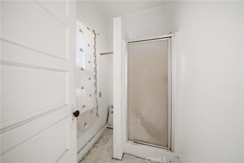 1346 Morro Street San Luis Obispo, CA 93401 - Photo 13 of 19 a bathroom with a bathtub and shower