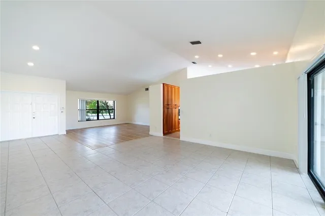 a kitchen with stainless steel appliances a sink stove and cabinets
