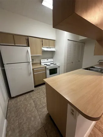 $225,000 | 18356 Northwest 68th Avenue, Unit K, Hialeah, FL 33015