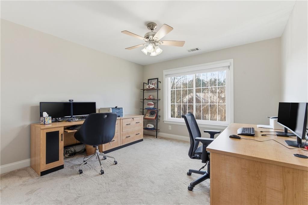 4415 Brampton Way Cumming, GA 30041 - Photo 31 of 59 a view of a workspace with furniture and a window