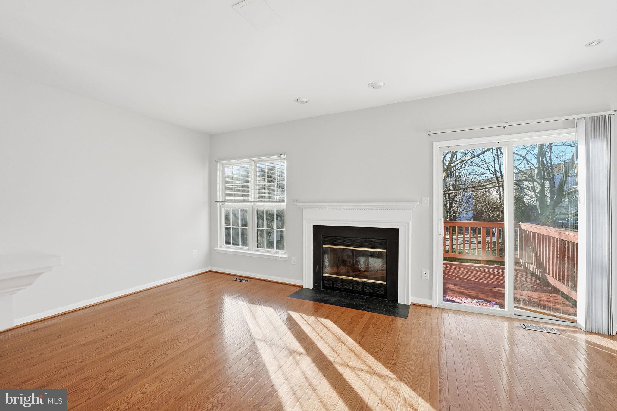 45563 Whitcomb Square Sterling, VA 20166 - Photo 8 of 27 Living room with wood burning fireplace