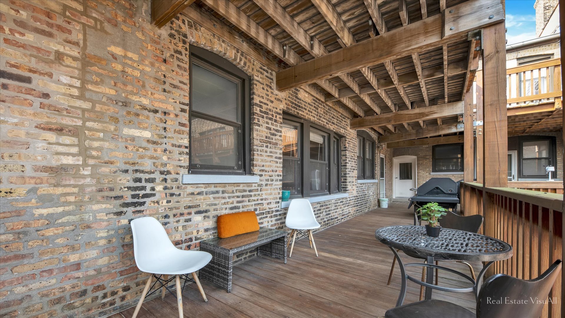 1340 West Irving Park Road, Unit 2 Chicago, IL 60613 - Photo 21 of 25 a view of a chairs in patio of the house