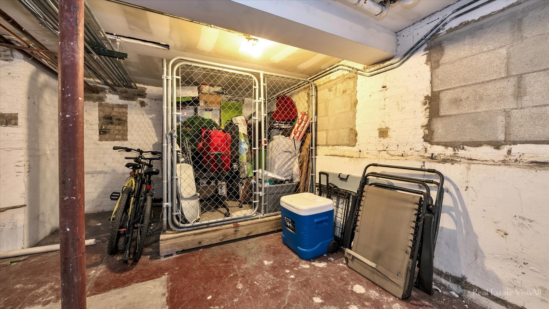 1340 West Irving Park Road, Unit 2 Chicago, IL 60613 - Photo 23 of 25 a view of a storage room with a sink and storage and utility room