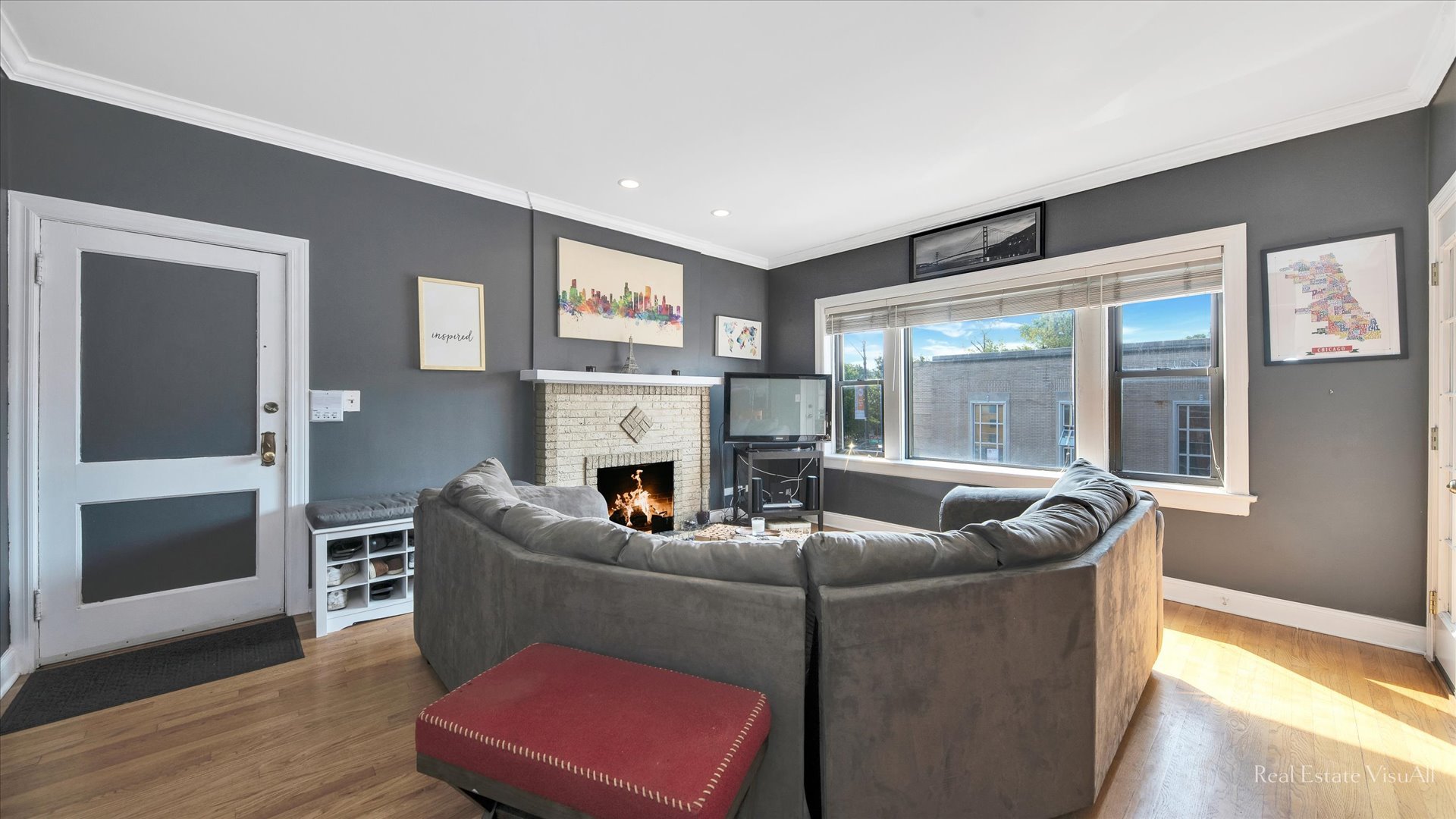 1340 West Irving Park Road, Unit 2 Chicago, IL 60613 - Photo 6 of 25 a living room with furniture window and a fireplace