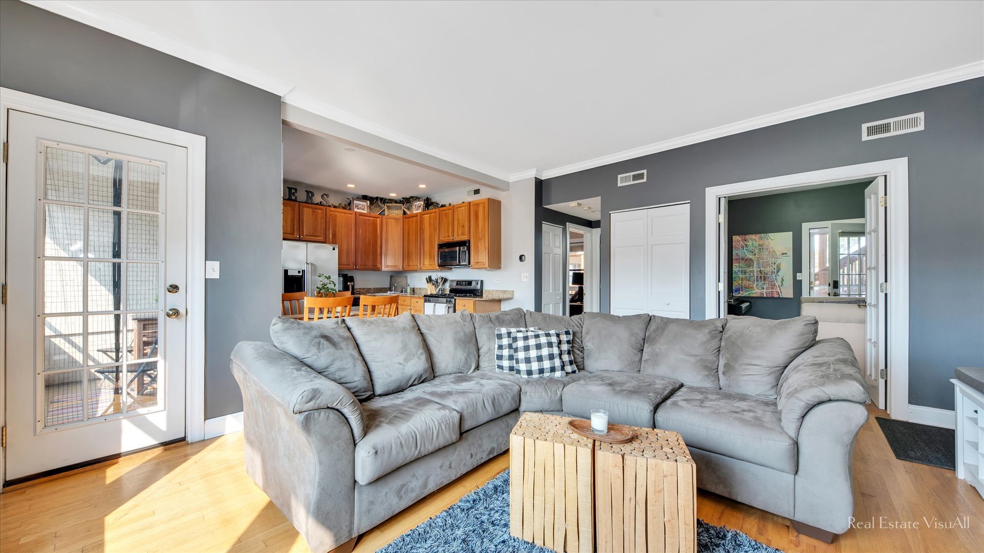 1340 West Irving Park Road, Unit 2 Chicago, IL 60613 - Photo 10 of 25 a living room with furniture and a large window