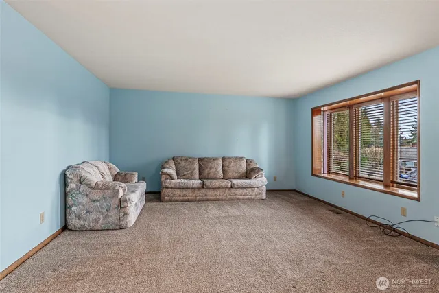 a view of a hallway with windows