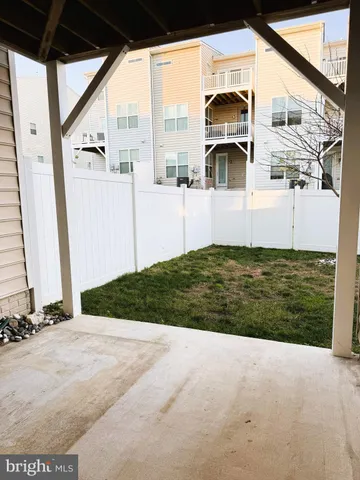 a view of a back yard of the house